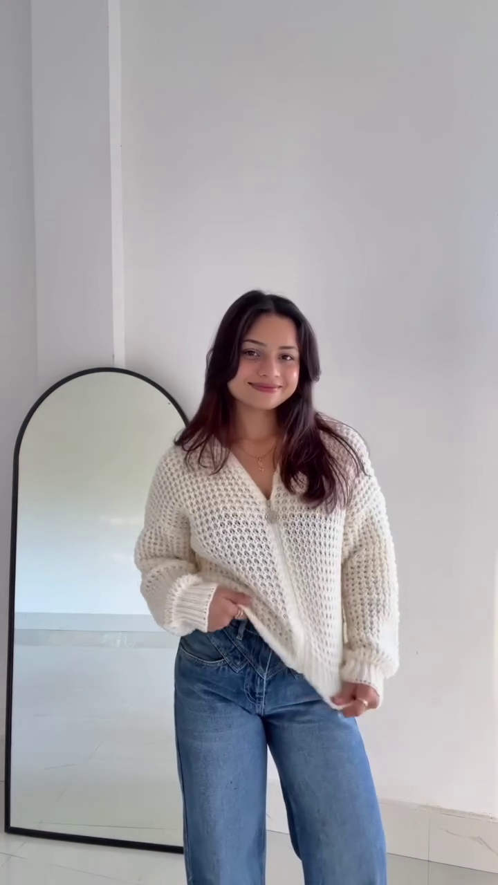 Cozy Cream Knit Sweater with Blue Jeans