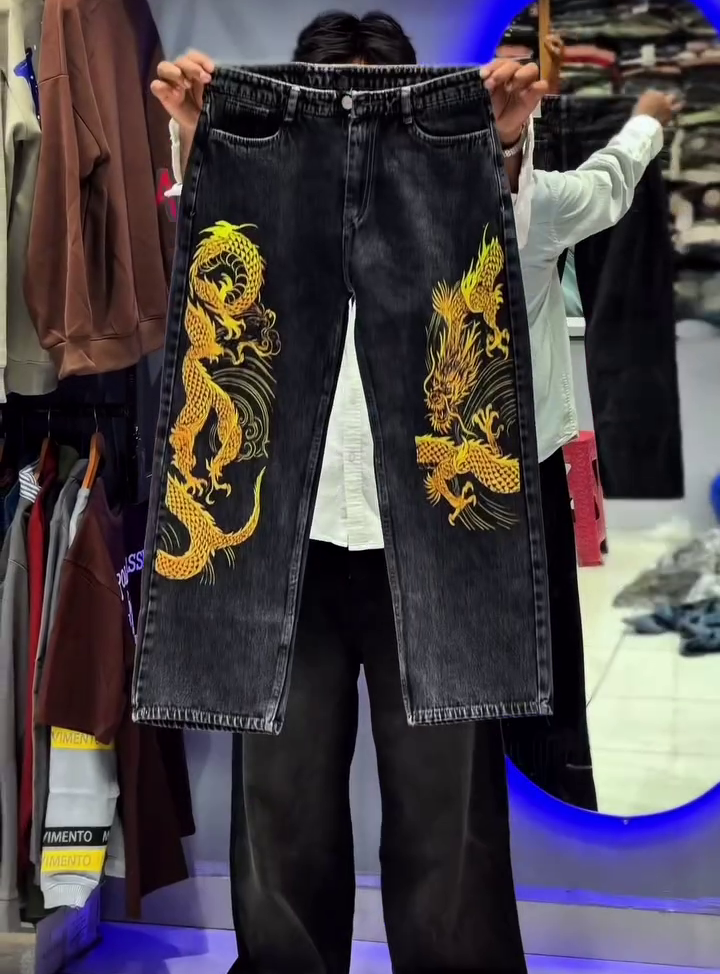 Light Blue Wide-Leg Denim Jeans with Bold Tribal Graphic Design