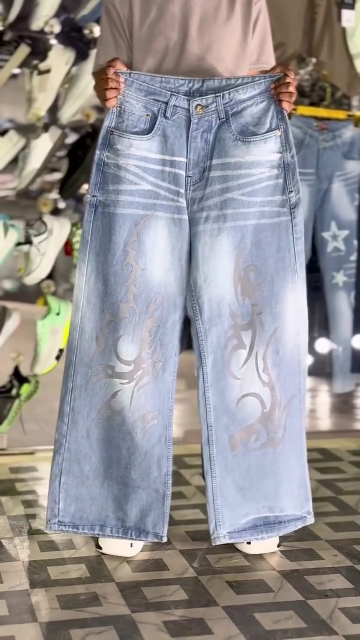 Stylish Light Blue Denim Jeans with Bold Eagle Graphic Design