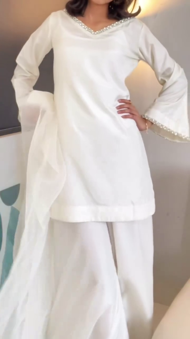 Timeless Elegance in Classic White Traditional Suit with Minimalist Detailing