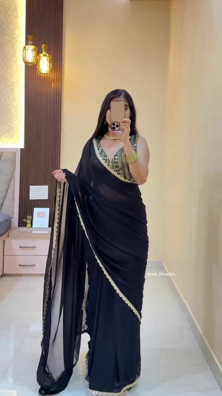 Elegant Black Georgette Saree with Gold Embroidered Blouse