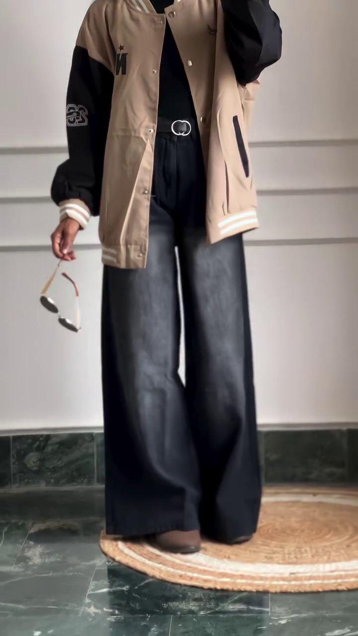 Modern Black High-Neck Top with Wide-Leg Leather Pants