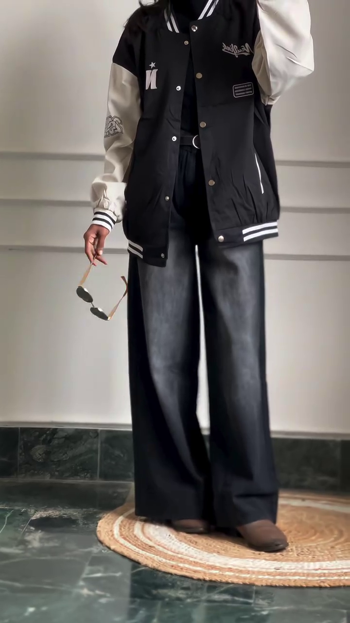 Modern Black High-Neck Top with Wide-Leg Leather Pants