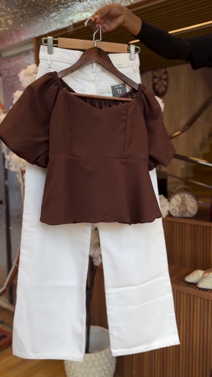 Elegant Brown Peplum Top with White Wide-Leg Pants