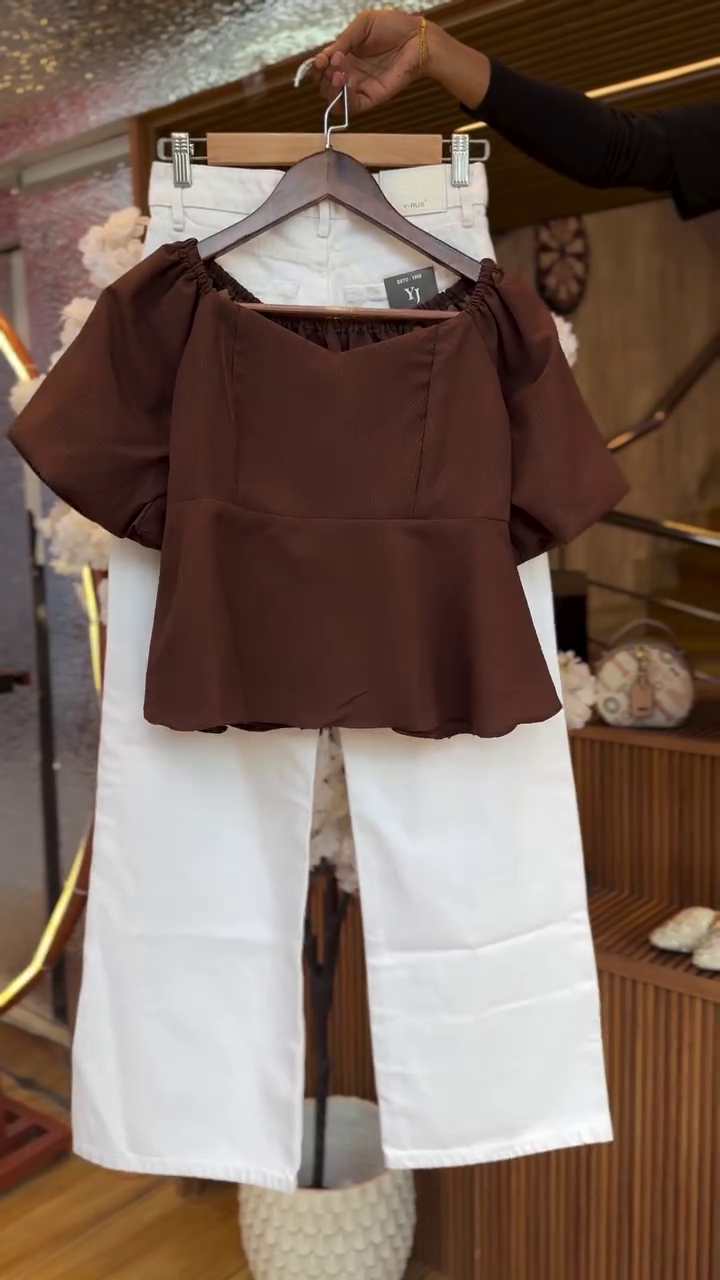 Elegant Brown Peplum Top with White Wide-Leg Pants